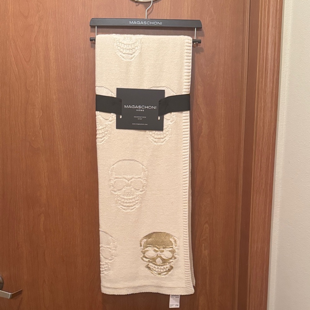 Magaschoni Ivory and Gold Skull throw blanket